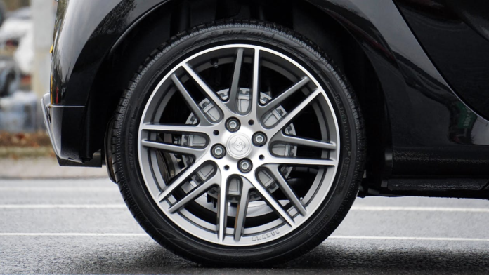 a closeup shot of a car’s wheels